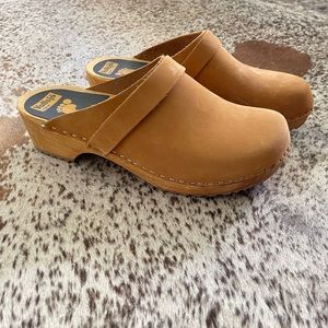 Suede leather wood clogs. Never worn. Beautiful tan leather.